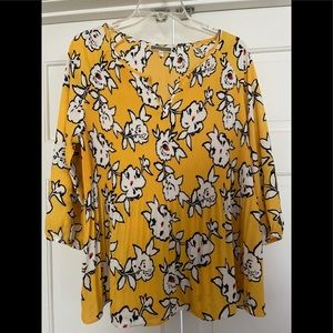NWOT Bright yellow and black blouse. Never worn.